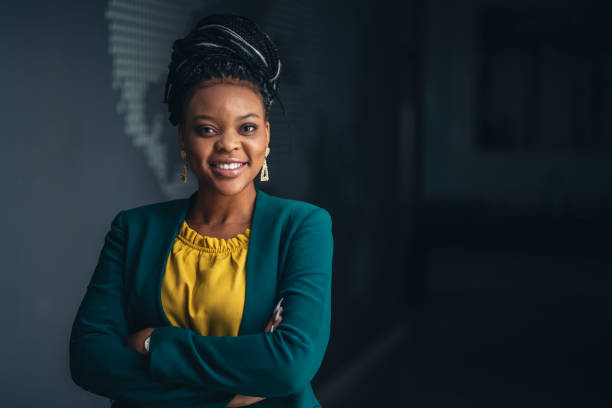Portrait of young African businesswoman in the office looking at camera